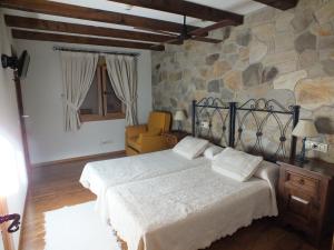 Postel nebo postele na pokoji v ubytování Centro de Turismo Rural El Recreo