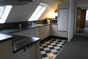 Kuchyň nebo kuchyňský kout v ubytování Mølvangvej 2 Jelling Apartment