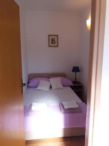 Postel nebo postele na pokoji v ubytování Apartman Matić