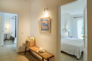 Voodi või voodid majutusasutuse Skiathos Holidays Suites & Villas toas