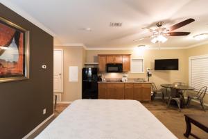 a living room with a kitchen and a dining room at Goulding's Lodge in Monument Valley