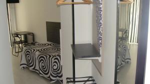 A bed or beds in a room at Hostal JQ Madrid 1