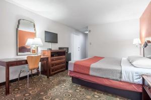 Ένα ή περισσότερα κρεβάτια σε δωμάτιο στο Motel 6-Hope, AR