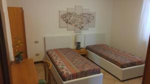 Postel nebo postele na pokoji v ubytování B&B Benjamin