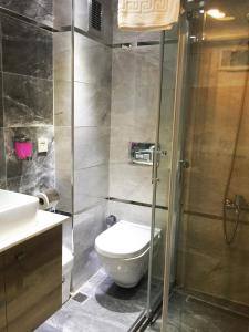 Koupelna v ubytování Nida Hotel Cıty Center