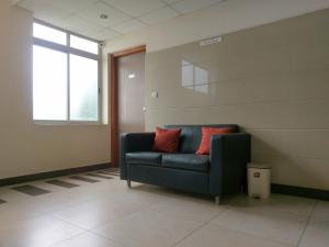 Χώρος καθιστικού στο Banyan Tree Comforts Mysore