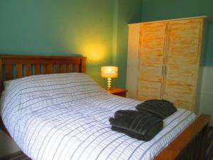 Voodi või voodid majutusasutuse The Old Kitchens toas