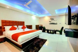 Giường trong phòng chung tại Hotel Hillton Inn