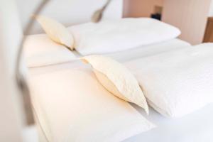 Ένα ή περισσότερα κρεβάτια σε δωμάτιο στο Hotel Markushof - Adults only