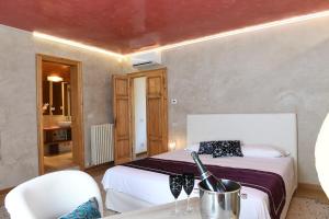 Postel nebo postele na pokoji v ubytování Amor Mio B&B