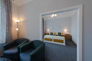 Posteľ alebo postele v izbe v ubytovaní Hotel Soudek