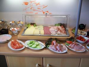 a buffet with many different types of food on a table at Haus Darmstadt in Ankelohe