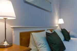 Posteľ alebo postele v izbe v ubytovaní Hotel Soudek