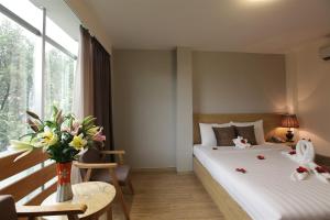 Giường trong phòng chung tại Minh Tam Hotel & Spa 3/2