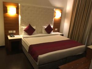 Postel nebo postele na pokoji v ubytování Hotel Ivory 32