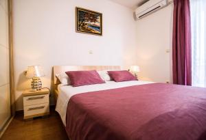 Postel nebo postele na pokoji v ubytování Villa Dusanka + 39 fotografií