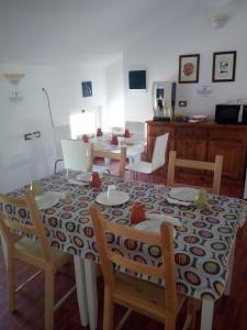 Una televisión o centro de entretenimiento en B&B Q3 Home