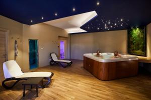 Postel nebo postele na pokoji v ubytování Alba D'Amore Hotel & Spa