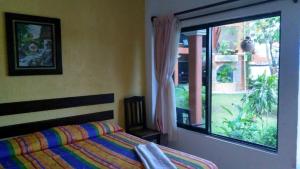 Giường trong phòng chung tại Real del Ambar