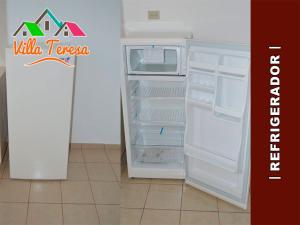 Kitchen o kitchenette sa Departamentos & Suites Villa Teresa
