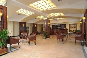 Posedenie v ubytovaní Hotel de France