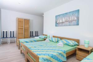 Ένα ή περισσότερα κρεβάτια σε δωμάτιο στο Luxury Rooms Ivana