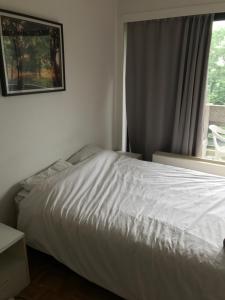 
A bed or beds in a room at Apartment Zaventem Brussels Airport J
