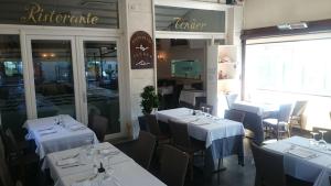 En restaurang eller annat matställe på Appartamento Giulia