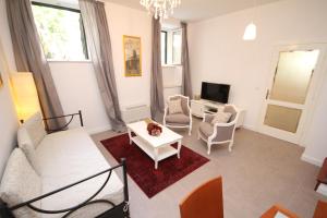 TV a/nebo společenská místnost v ubytování Dolce Vita Apartment