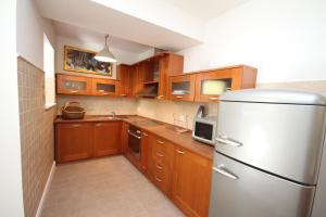 Kuchyň nebo kuchyňský kout v ubytování Dolce Vita Apartment