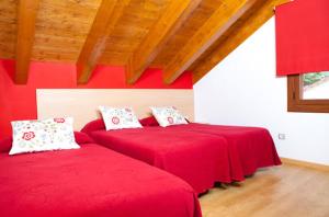 Postel nebo postele na pokoji v ubytování Apartahotel Castejón de Sos