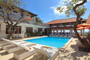 Bazén v ubytování Villa Agung Beach Inn nebo v jeho okolí