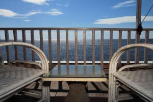 Balkón nebo terasa v ubytování Villa Agung Beach Inn