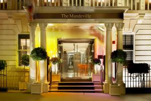 a building with a sign that reads the mandeville at The Mandeville Hotel in London