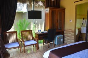TV a/nebo společenská místnost v ubytování Coco Bungalows Hoi An