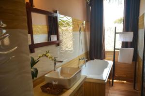 Koupelna v ubytování Coco Bungalows Hoi An + 37 fotografií