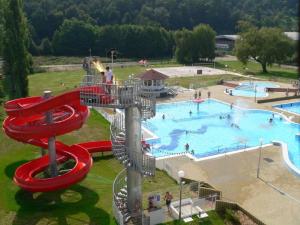 a water park with a water slide and a pool at Apartman Ortenova 74 in Kutná Hora