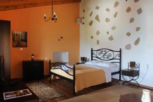 Letto o letti in una camera di Ikaria Utopia - Cusco Studios