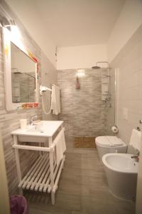 Koupelna v ubytování Hotel Albatros