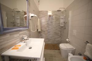 Koupelna v ubytování Hotel Albatros