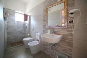 Koupelna v ubytování Hotel Albatros