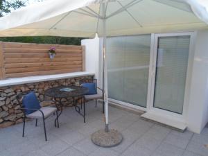 Patio alebo iná vonkajšia časť ubytovania Apartment Floresita