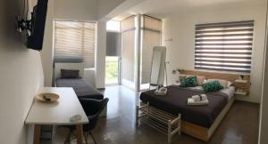 TV a/nebo společenská místnost v ubytování Corte Sveva B&B Affittacamere + 34 fotografií