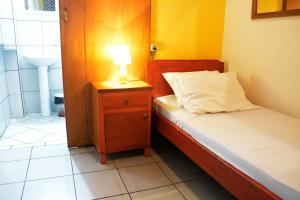 Krevet ili kreveti u jedinici u objektu El Viajero Asuncion Hostel & Suites