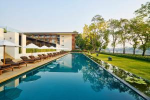 Bazén v ubytování Anantara Chiang Mai Resort nebo v jeho okolí