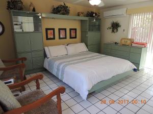 Postel nebo postele na pokoji v ubytování Casa Larrea Inn