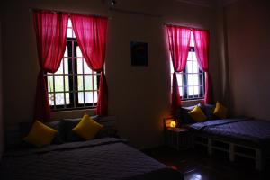 Ліжко або ліжка в номері Hotel An Nhien