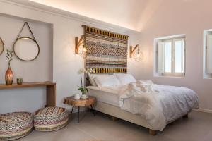 White & Co. Exclusive Island Villas tesisinde bir odada yatak veya yataklar