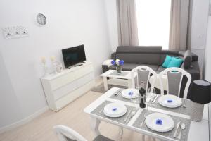 Гостиная зона в Apartament Pod Kopernikiem II