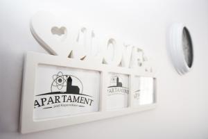 Certifikát, ocenenie alebo iný dokument vystavený v ubytovaní Apartament Pod Kopernikiem II